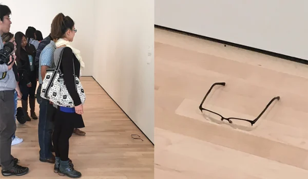Pair Of Glasses Left On Gallery Floor Mistaken For Art.